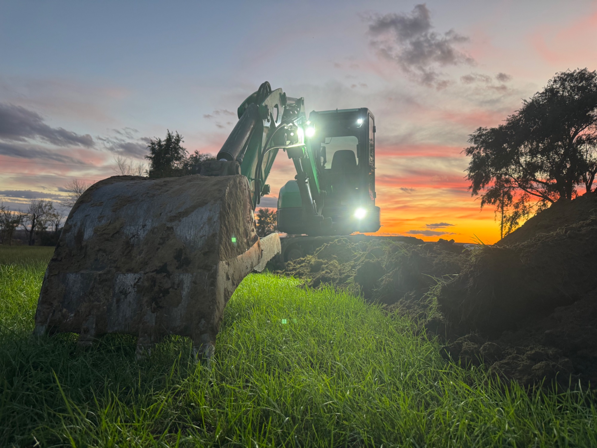 Trenching and utility installation services for water, sewer, and electrical lines in North Dakota